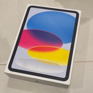 Apple iPad with Blue, Pink, and Yellow Display